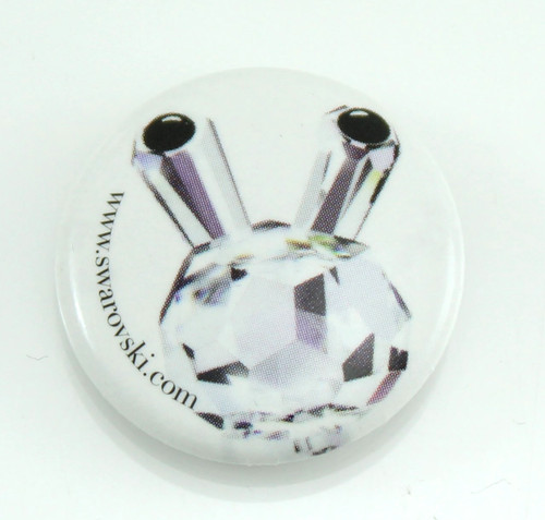 Swarovski spilla promozionale