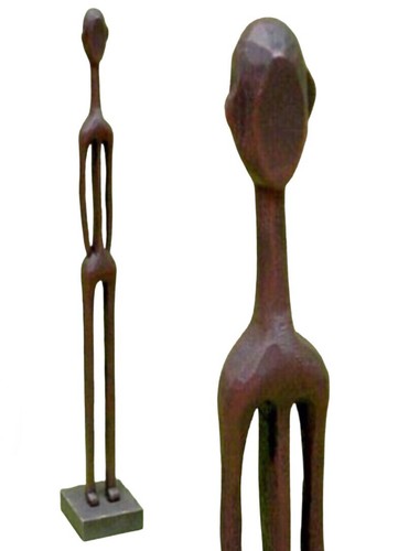 Scultura legno intagliata a - in,