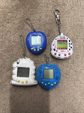 Disney Giga Pets & Tamagotchi giochi rari vintage retrò x4