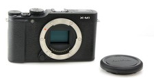 corpo fotocamera digitale mirrorless Fuji Fujifilm X-M1 in scatola per obiettivi Fuji X Mount