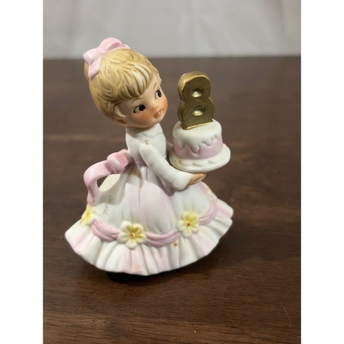 Statuina porcellana bambina