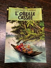 CARTE POSTALE 15X10 HOMMAGE A HERGE  PASTICHE TINTIN L'OREILLE CASSEE DANY