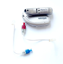 Sinistra e Destra Oticon More 3 mnr R colore beige + con caricatore + con altoparlanti