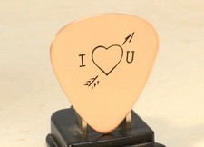 plettro per chitarra in rame