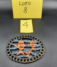 Sottopentola in ghisa con pesci