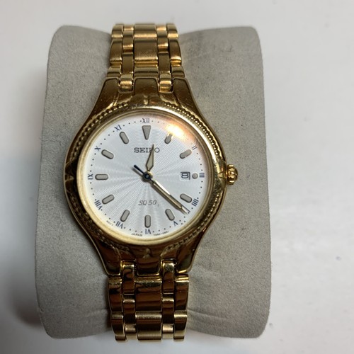 Nice seiko sq50 gold tone - gold,