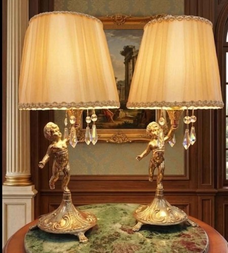Coppia lampade con putti - di,
