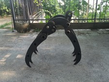 pinza legna pietre mini escavatore