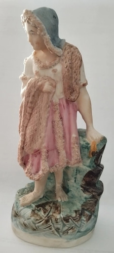 Una bellissima statuetta - , di