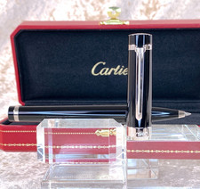 Penna a sfera Cartier Pasha in resina nera bordo palladio con custodia