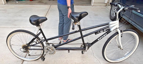 Tandem bicycle black and white - and,