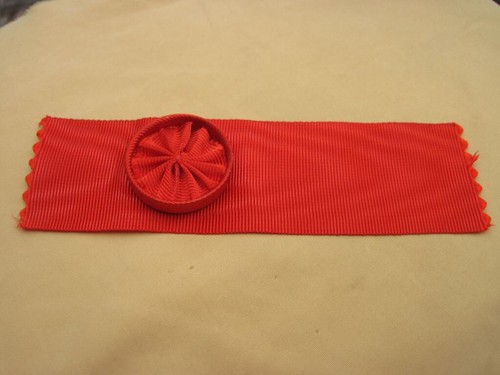Coupe ruban avec rosette - de,