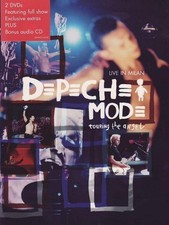 DEPECHE MODE – TOURING THE