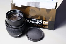 Olympus OM 100 mm f/2.0 per