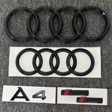 KIT COMPLETO LOGHI AUDI A4 nero lucido fregi ANTERIORE + POSTERIORE targhette A4