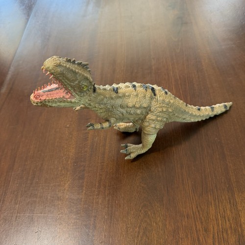 Disney dinoland carnotaurus - disney,