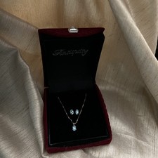 Set collana e orecchini a perno in oro 14 kt con topazio