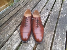 scarpe uomo console chiesa
