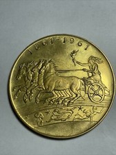 Moneta, Medaglia- Primo