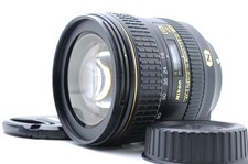 Eccellente + 5 obiettivi Nikon