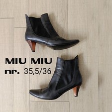 MIU MIU Stivaletti In Pelle Nera Ankle Chelsea Boots