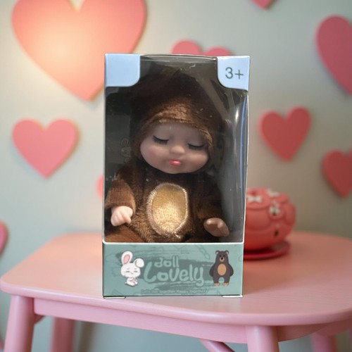 Adorabile mini bambola per