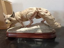 volpe ceramica CACCIAPUOTI  con base legno + statuine