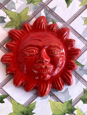 Ceramic sun decorated with