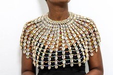 Mantello conchiglia di cowrie