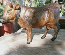 Antica statuetta-giocattolo bue in legno e cartapesta,dipinto a mano.