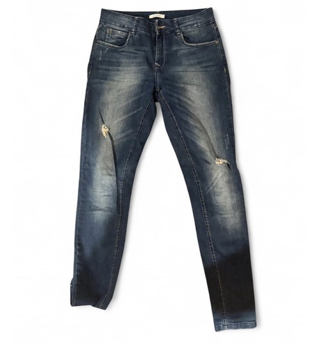 Jeans skinny strappati blu