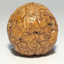 NOCE CON FIGURE ORIENTALI INTAGLIATE OPERA ARTIGIANALE 