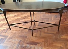 Tavolo ovale in legno con base in ottone 