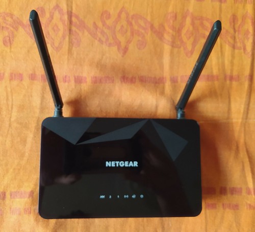 Netgear d1500 modem con router - modem,