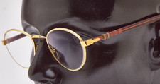 ? occhiali vintage PERSOL JOEL RATTI montatura ORO MARRONE 1990s?UNISEX