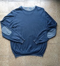 Pullover blu toppe ai gomiti a