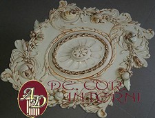 Rosoni in gesso decorati