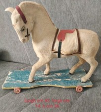 CAVALLO IN CARTAPESTA CON RUOTE  IN LEGNO. Anno 1920