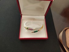 Bracciale semirigido in oro e smalti