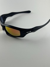 Oakley Monster Pup nero lucido rubino iridio lente cromo icone cane 12-886