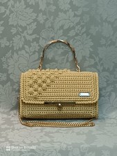 Borse donna lavorate a