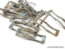 Orecchini lunghi ondulati