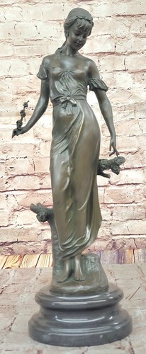 Statua bronzo donna - in,
