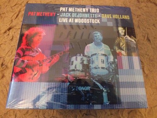 Live woodstock pat - at, by