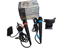 Pacchetto 9 giochi PlayStation 2 SingStar 2 microfoni 1 adattatore USB fotocamera EyeToy PS2