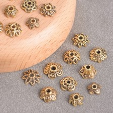 Lotto 50 pezzi tappi perline a