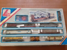 Lima grande scatola contenente un treno merci con carro gru usato pochissimo