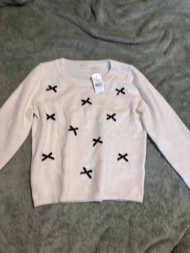 Maglione panna con fiocchi