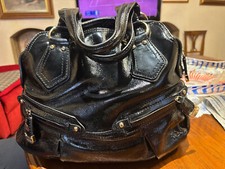 Borsa Cromia nera vera pelle mai usata.