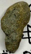 Pietra intagliata effigie di